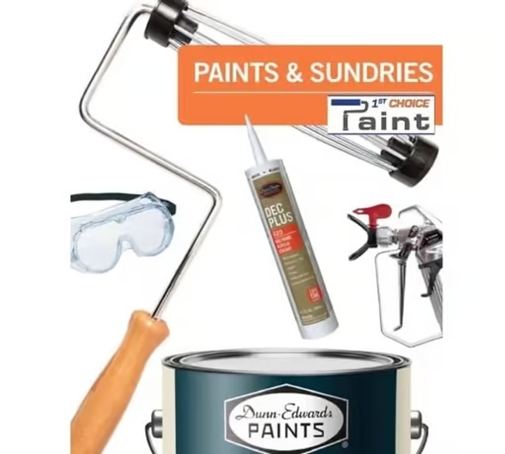 Paint can surrounded by supplies needs for a paint project - roller, brush, caulking, gloves and protective glasses.